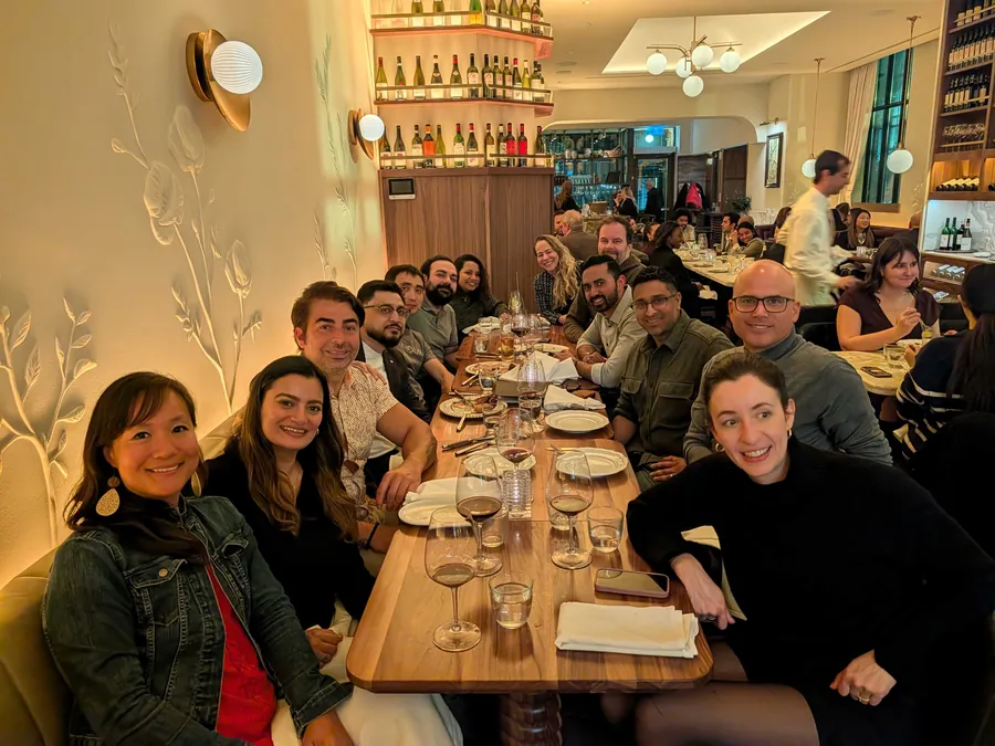 The CWX team around a long dinner table